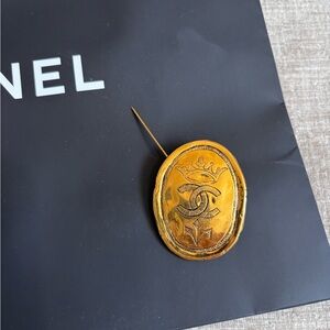 Authentic CHANEL regal crown logo medallion brooch circa 1980s